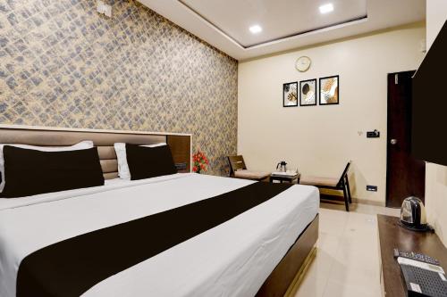 super collection o vyara railway station formerly crystal guest house