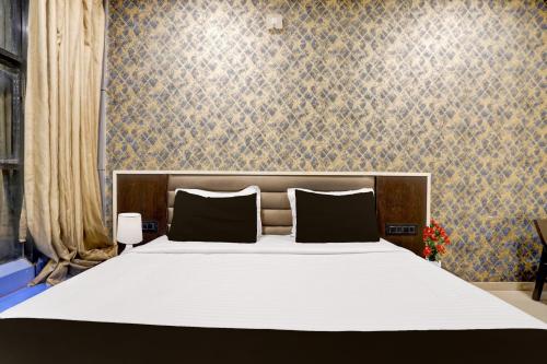 super collection o vyara railway station formerly crystal guest house