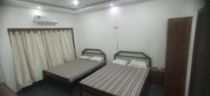 ashtapadi tourist home
