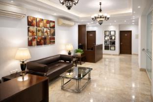 emblem arjun marg golf course road