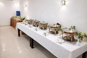 emblem arjun marg golf course road