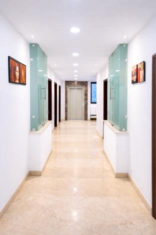 emblem arjun marg golf course road