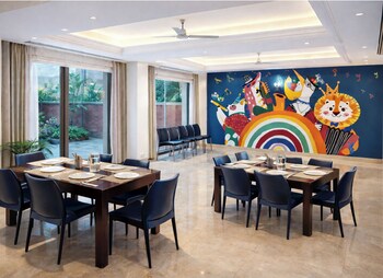 emblem arjun marg golf course road