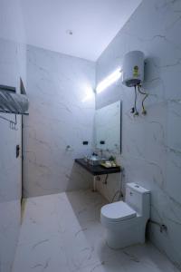 oakwood resorts and farms manesar binola