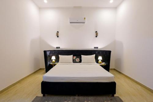 oakwood resorts and farms manesar binola