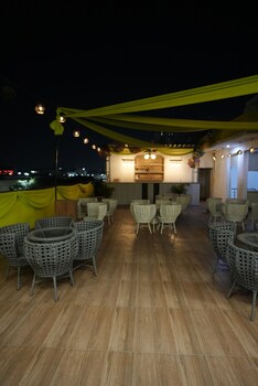 frolic hotel near sec 52 noida metro station