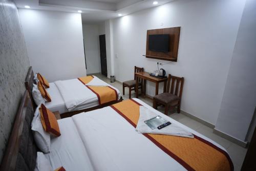 frolic hotel near sec 52 noida metro station
