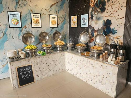 frolic hotel near sec 52 noida metro station