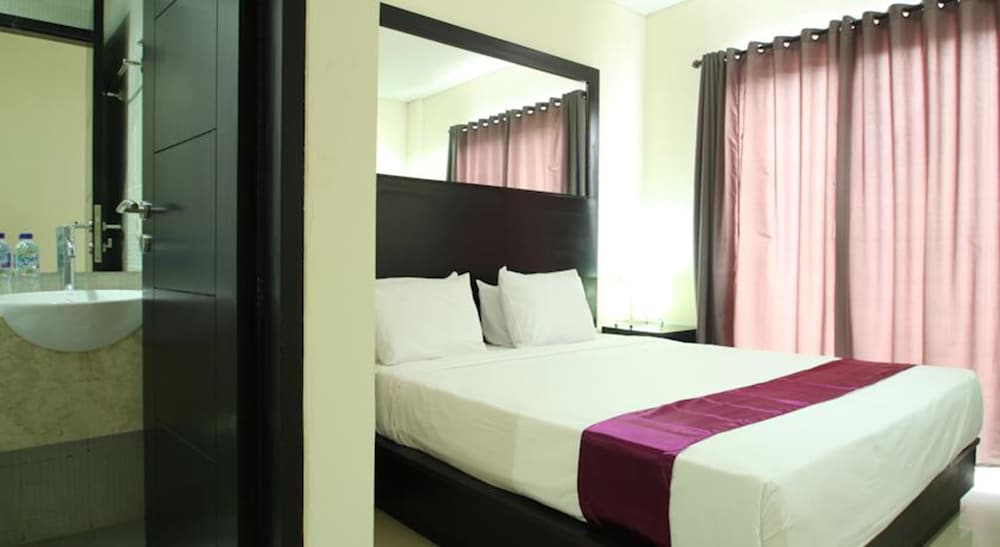 kuta airport insta hotel