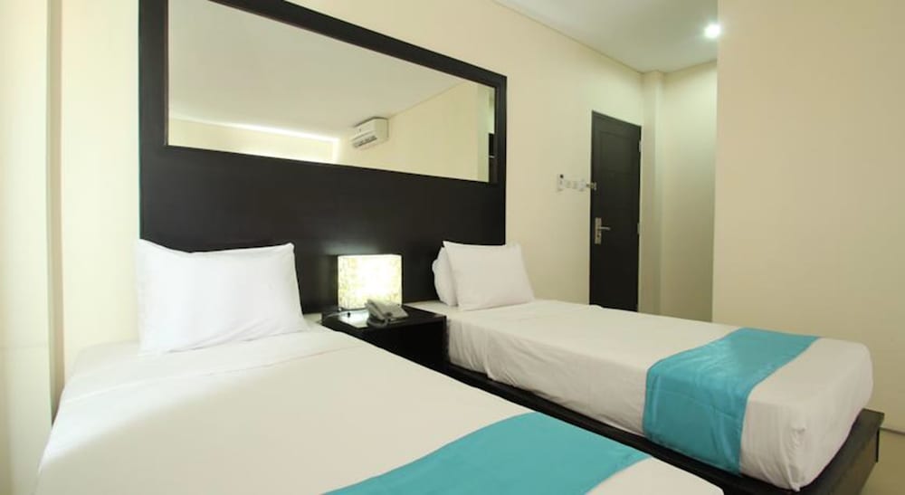 kuta airport insta hotel