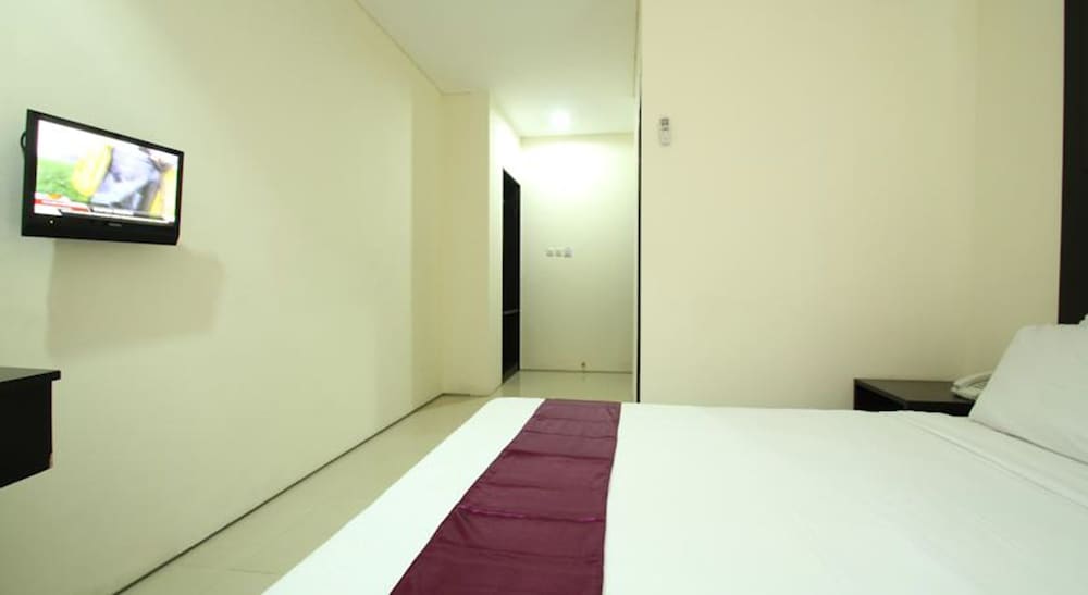 kuta airport insta hotel