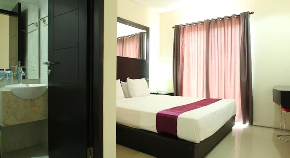 kuta airport insta hotel