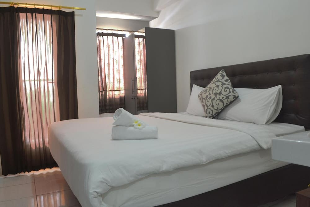 quintessa room at candiland apartement