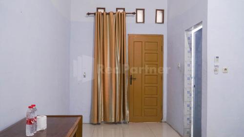 the karos residence mitra reddoorz