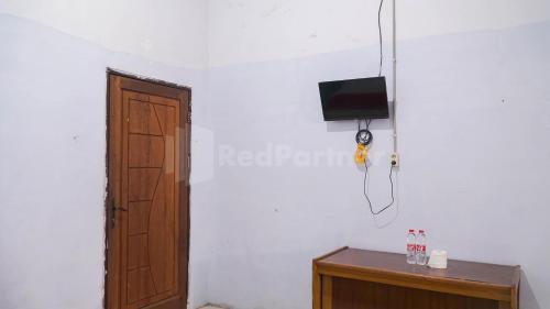 the karos residence mitra reddoorz
