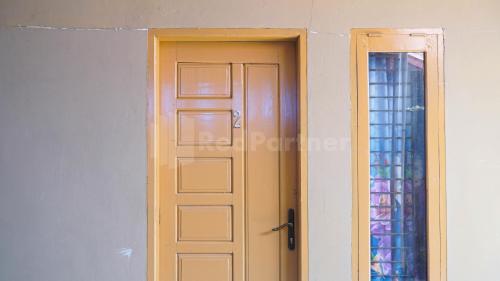 the karos residence mitra reddoorz