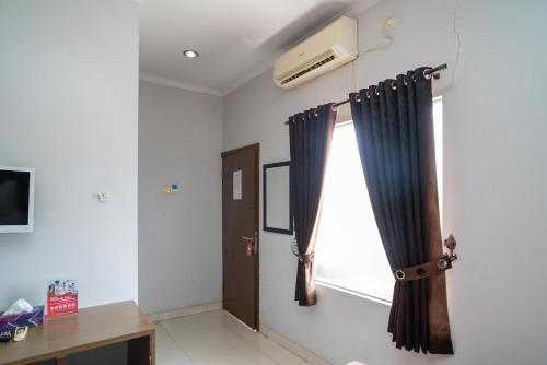 reddoorz syariah near tugu dodol kandangan