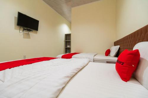 reddoorz aldos villa silangit