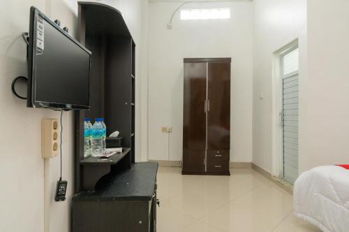 reddoorz syariah near universitas putra indonesia padang