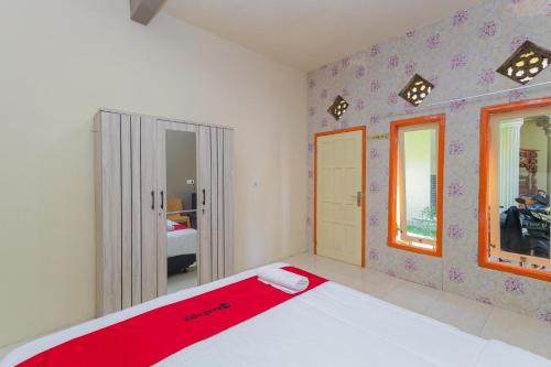 reddoorz plus villa bontes batu