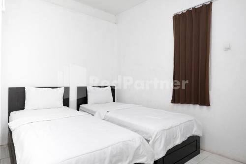 katup guest house syariah mitra reddoorz