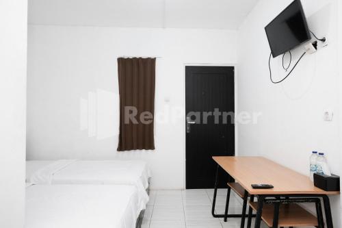 katup guest house syariah mitra reddoorz