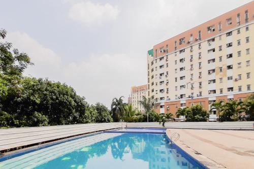 redliving apartemen modernland lian property tower biru