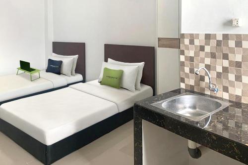 urbanview hotel juanda kota agung by reddoorz