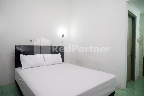 Camila Living Yogyakarta Redpartner,,1 star