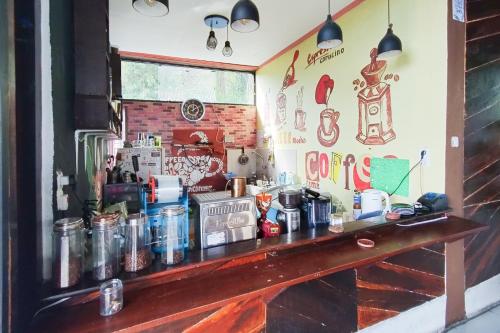 as resto cafe and hotel mitra reddoorz