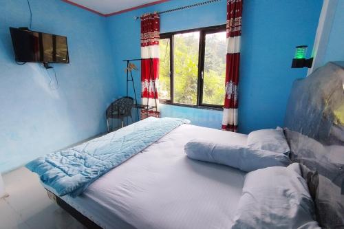as resto cafe and hotel mitra reddoorz