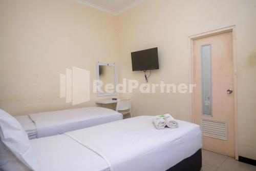 griya loka 2 syariah near simpang lima mitra reddoorz