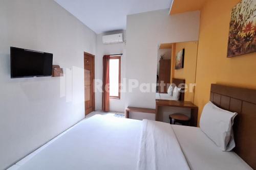 nirvana inn seturan mitra reddoorz