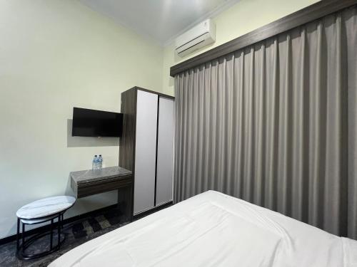 nofrah house syariah mitra reddoorz