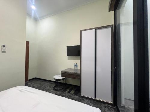 nofrah house syariah mitra reddoorz