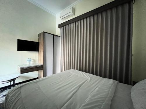 nofrah house syariah mitra reddoorz