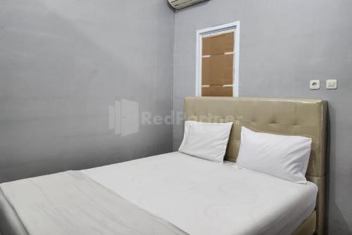 Puspita Homestay Mitra Reddoorz,,2 star