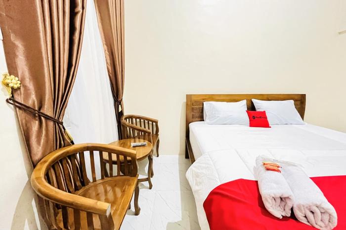 reddoorz gunari guest house merek karo