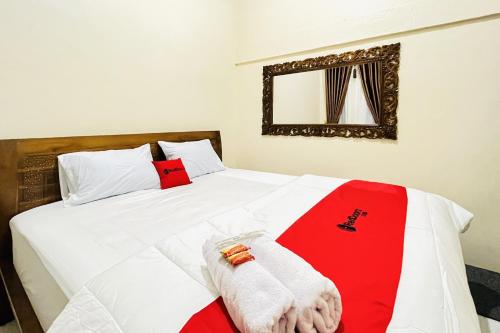 reddoorz gunari guest house merek karo