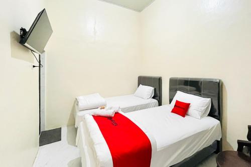 reddoorz gunari guest house merek karo