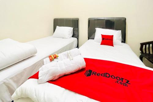 reddoorz gunari guest house merek karo