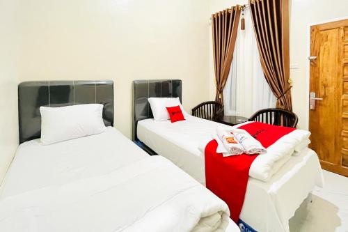reddoorz gunari guest house merek karo