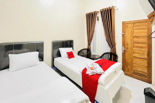 reddoorz gunari guest house merek karo