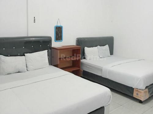 reddoorz pantai sayangheulang