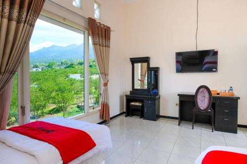 reddoorz jestro guest house batu