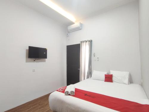 reddoorz near graha saba buana 2