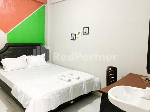 reddoorz syariah de kostmarto uty