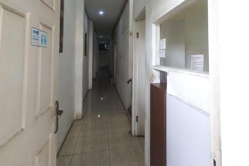 reddoorz syariah near rs siti khodijah sepanjang