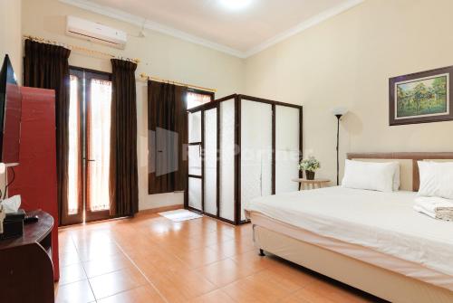 sr residence near mall ciputra cibubur mitra reddoorz