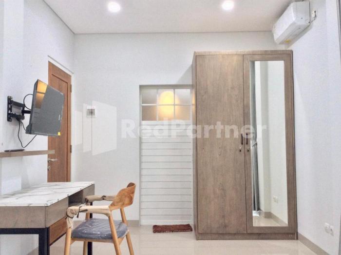 terra guesthouse jec mitra reddoorz